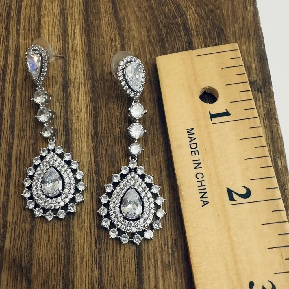 Elegant Silver color‎ Teardrop Earrings New never worn. Prom wedding